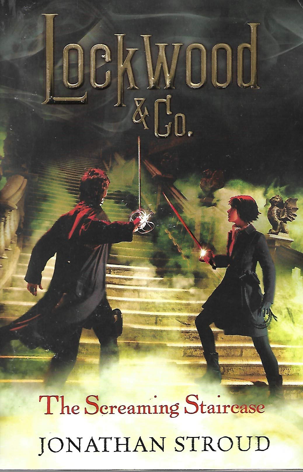 The Screaming Staircase By Jonathan Stroud [Paperback] book cover