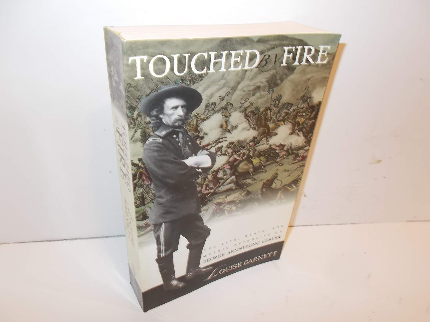 Touched by Fire: The Life, Death, and Mythic Afterlife of George Armstrong Custer (Owl Book) book cover