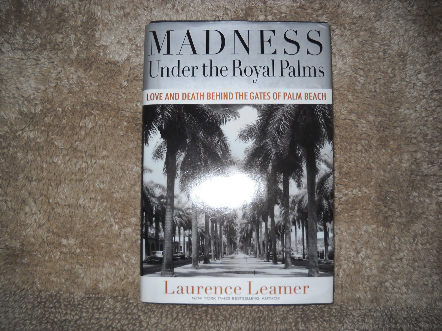 Madness Under the Royal Palms: Love and Death Behind the Gates of Palm Beach book cover